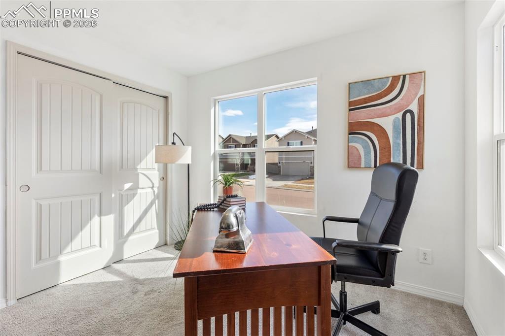 Image 29 of 44: Large lower-level family room offering additional space for entertainment, 