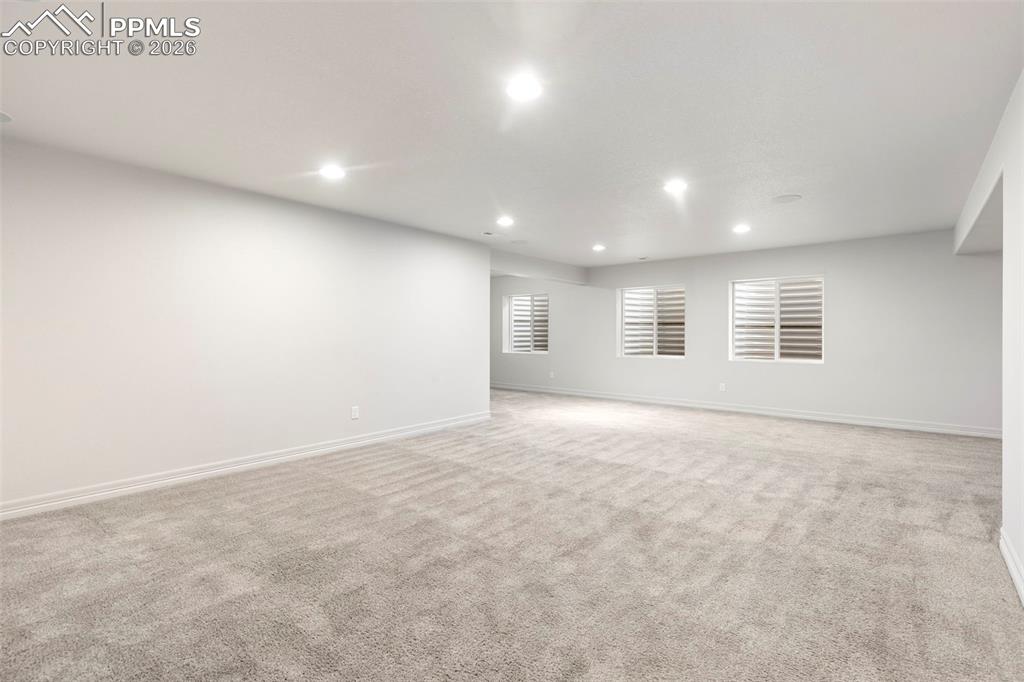 Image 32 of 44: Basement full bathroom with tub/shower combination, single-sink vanity, and