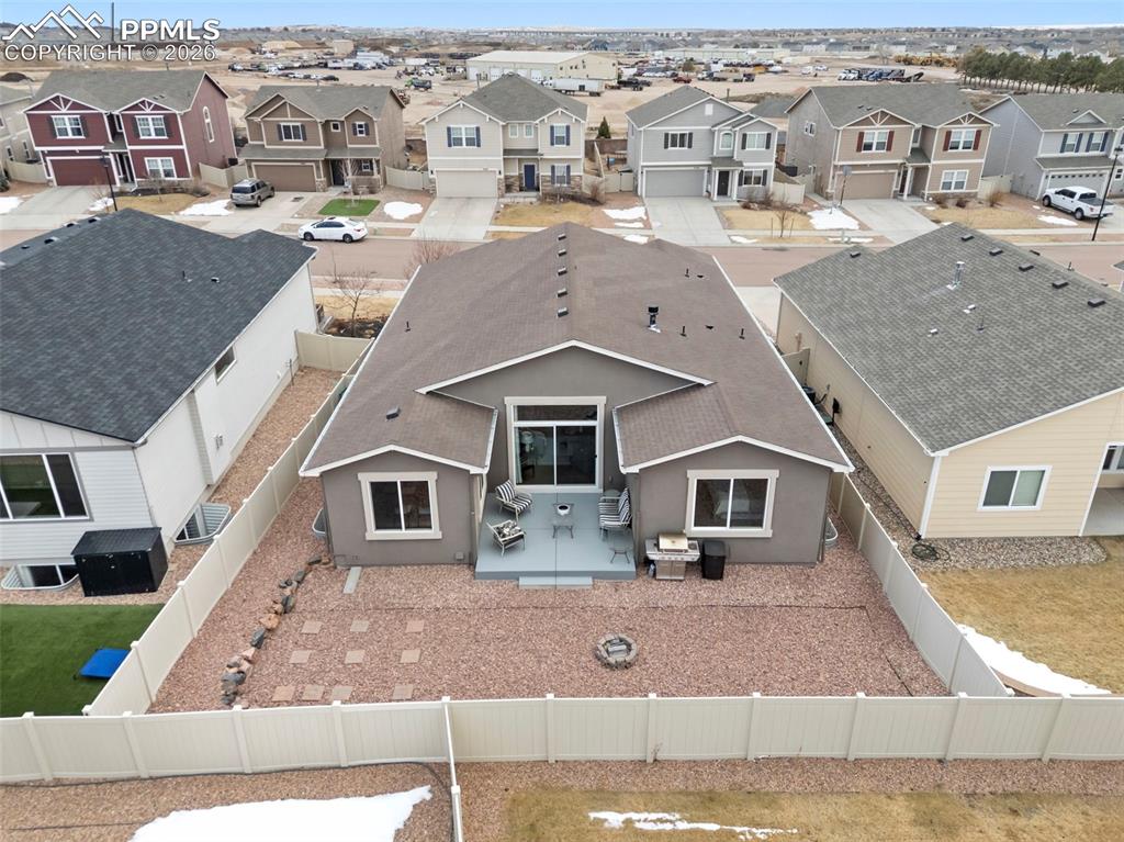 Image 39 of 44: Front exterior aerial of 2016-built stucco ranch with attached 2-car garage