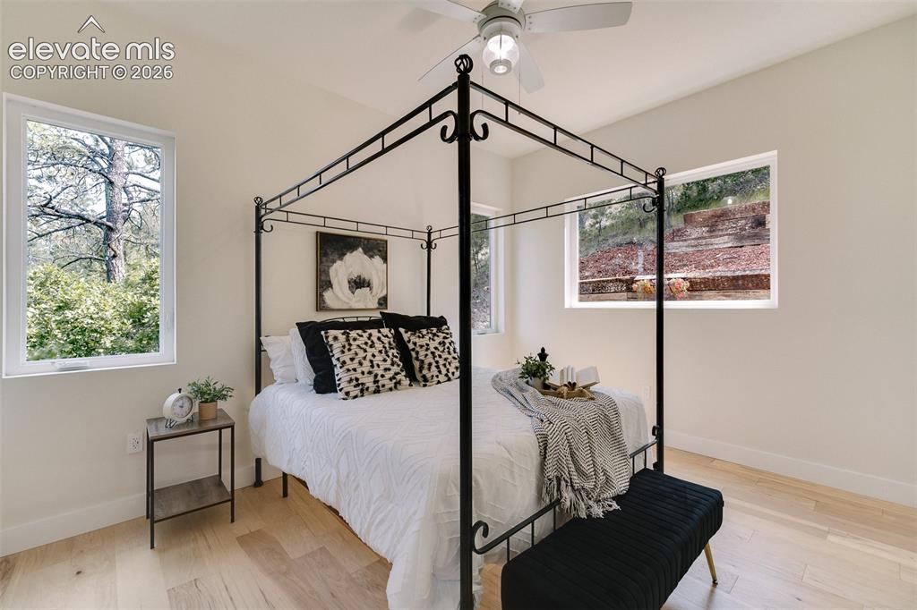 Image 11 of 49: Main Level Bedroom #2 is ideal for guests with a Full Bathroom nearby.