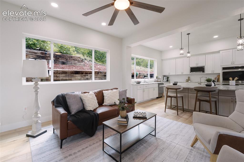 Image 19 of 49: The Great Room flows seamlessly into the Gourmet Kitchen making it easy to