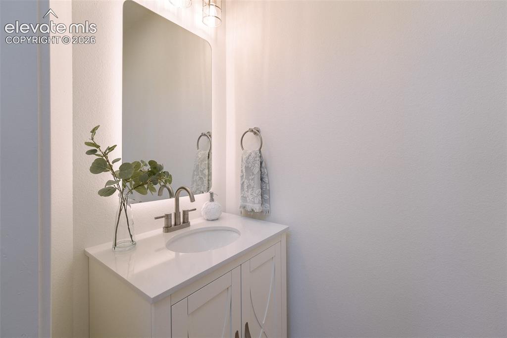 Image 24 of 49: Convenient main level Powder Bathroom.