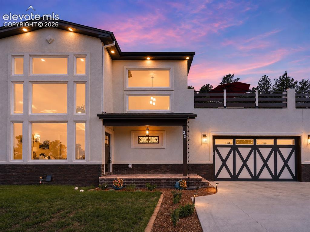 Image 5 of 49: Covered front entry.