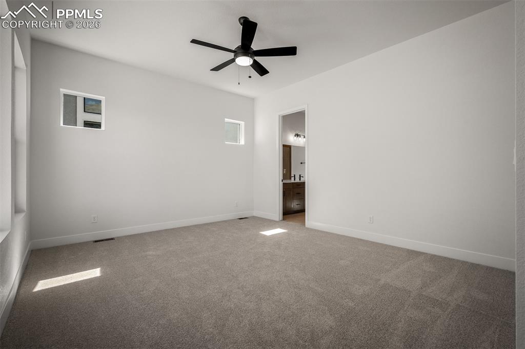 Image 21 of 40: Master Bedroom