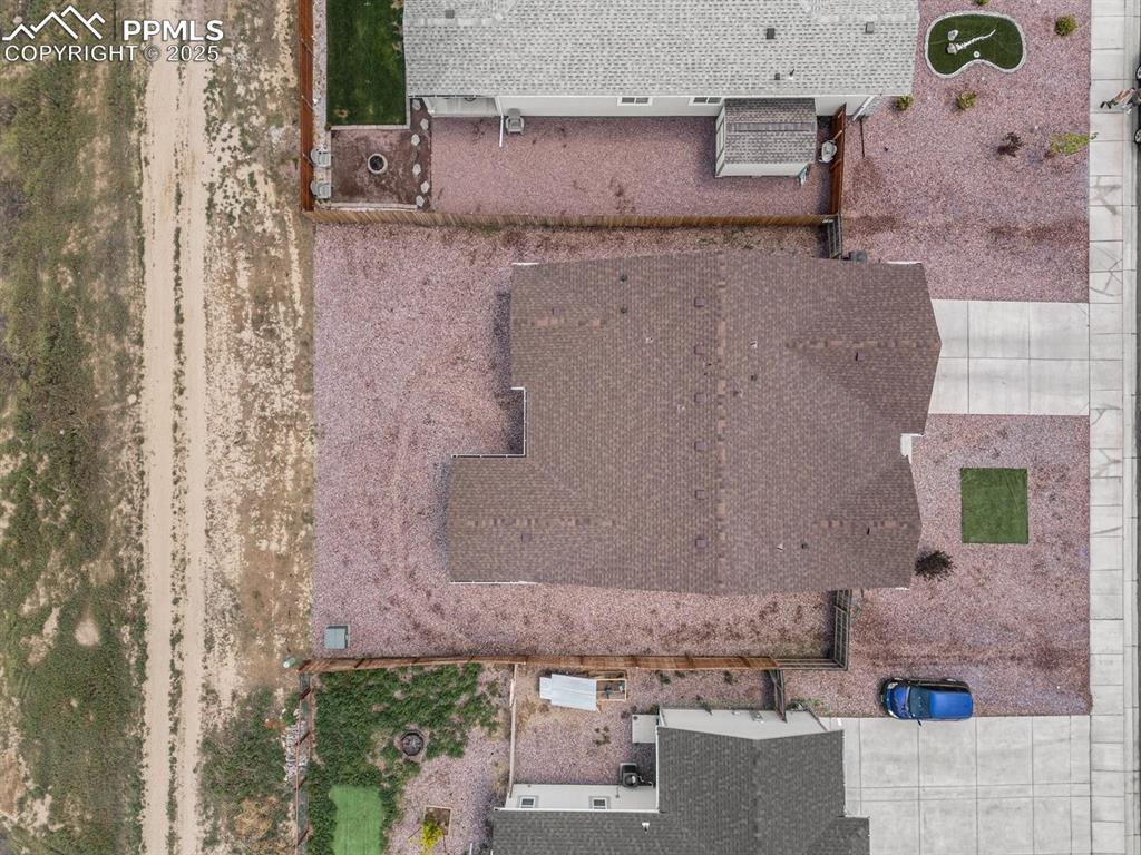 Image 25 of 25: Aerial view of property and surrounding area