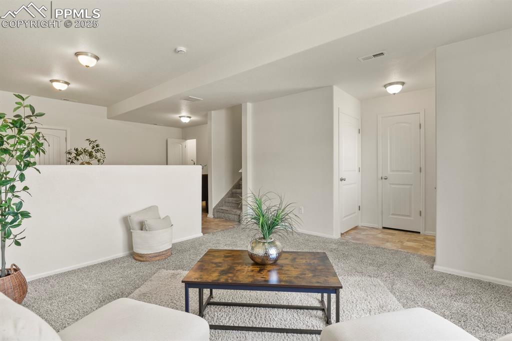 Image 7 of 36: Living Room with view of entry area