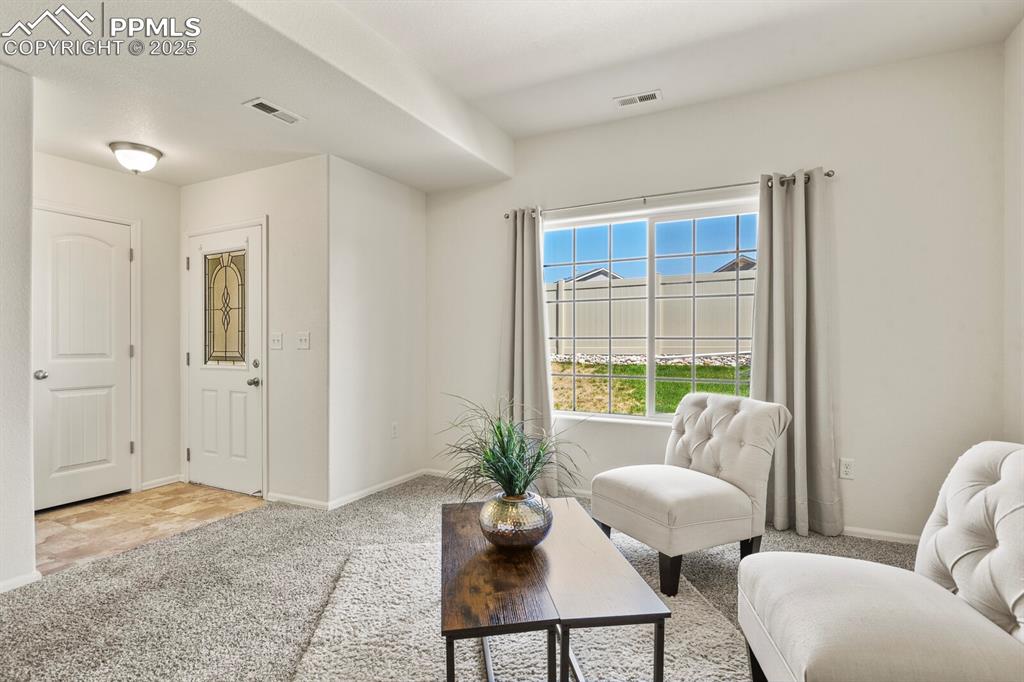 Image 8 of 36: Living Room with view of entry