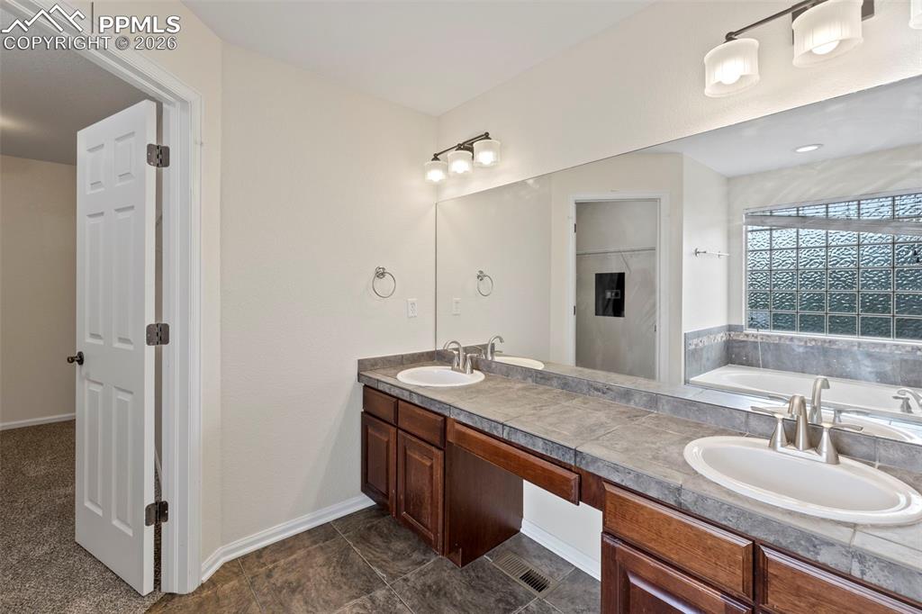 Image 24 of 48: Master Bathroom