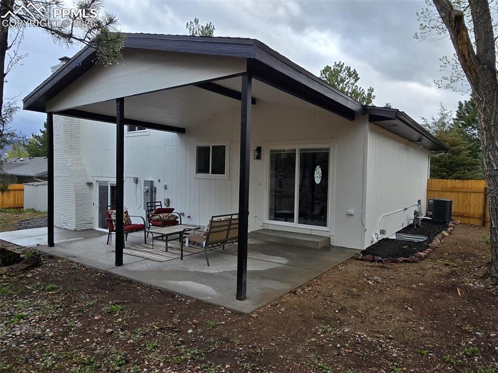 Image 42 of 48: Back of house featuring a patio area
