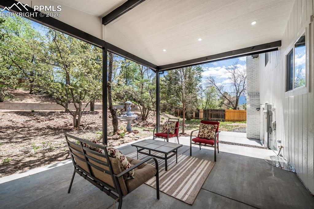 Image 45 of 48: View of patio featuring an outdoor living space