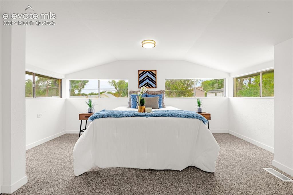 Image 12 of 33: Bedroom