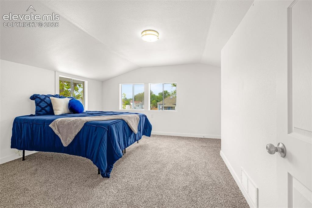 Image 16 of 33: Bedroom