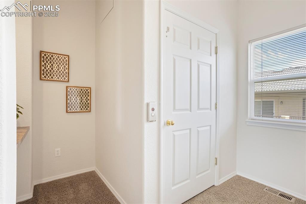 Image 18 of 29: Nook with upper level elevator