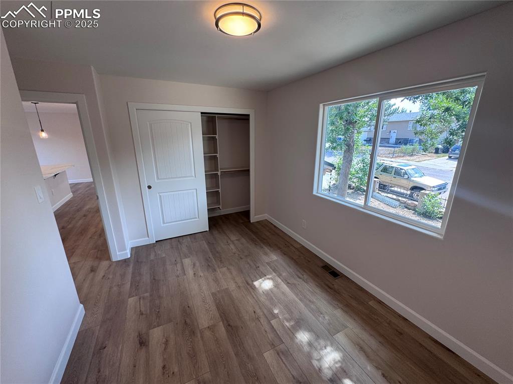 Image 20 of 36: Unfurnished bedroom featuring a closet and light wood-type flooring