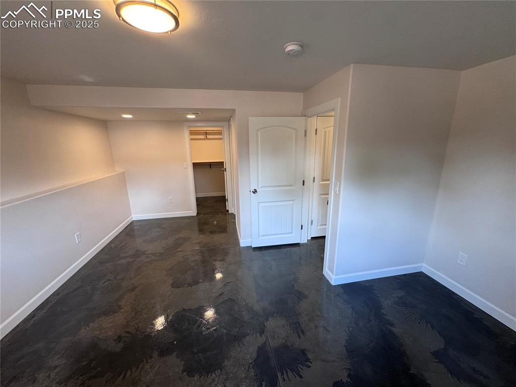 Image 28 of 36: Empty room featuring baseboards