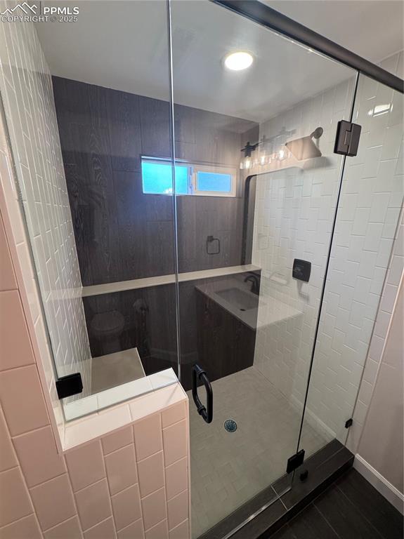 Image 33 of 36: Full bath featuring a stall shower