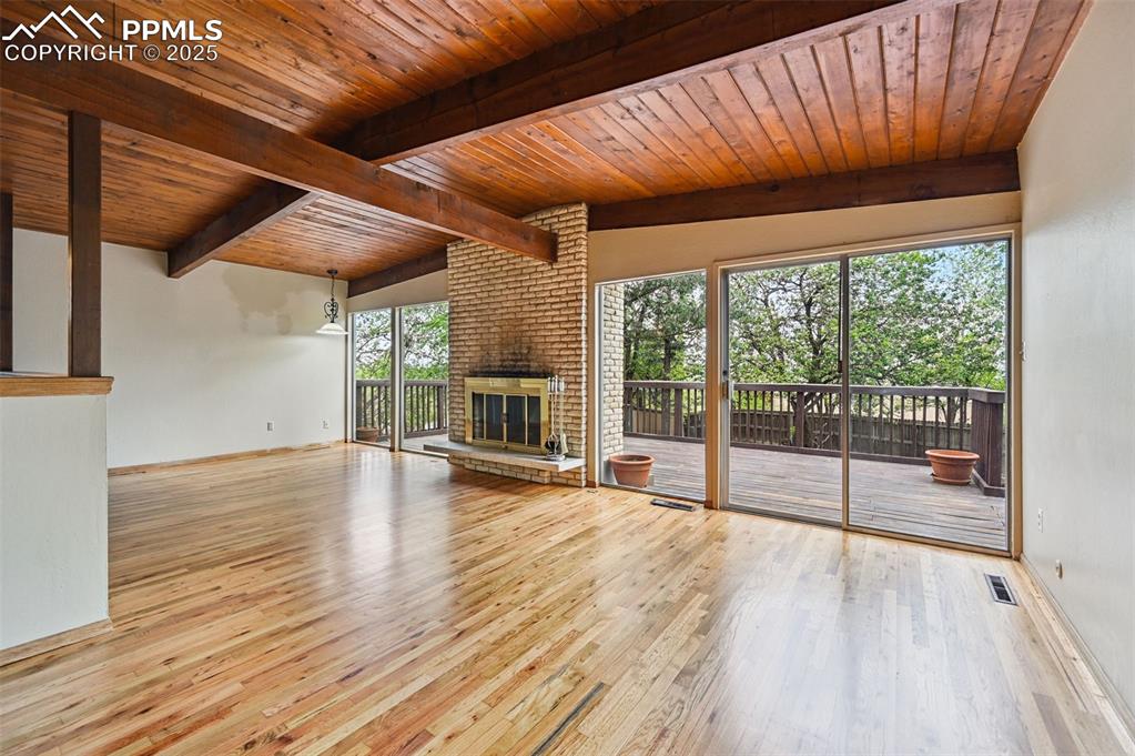 Image 11 of 44: living room w/walkout to deck