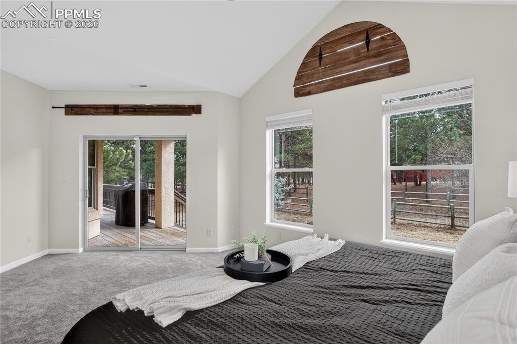 Image 13 of 35: Deck access from primary suite