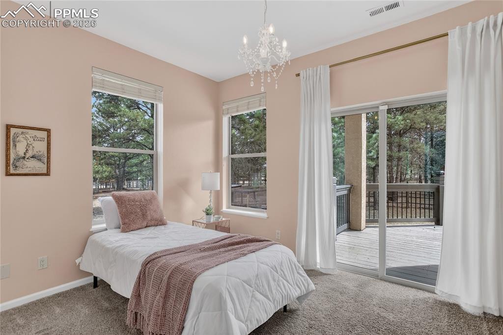 Image 18 of 35: Bedroom 3 - main level