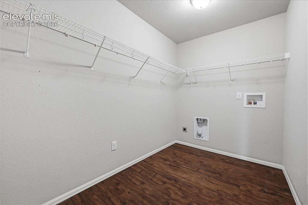 Image 21 of 29: Laundry room in upper level