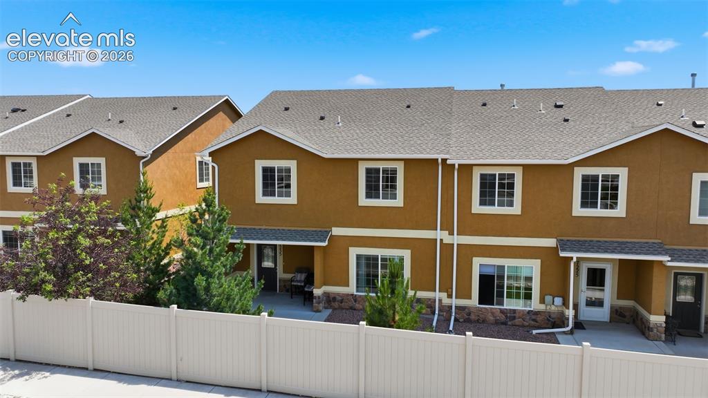 Image 26 of 29: End Unit Townhome with covered Porch