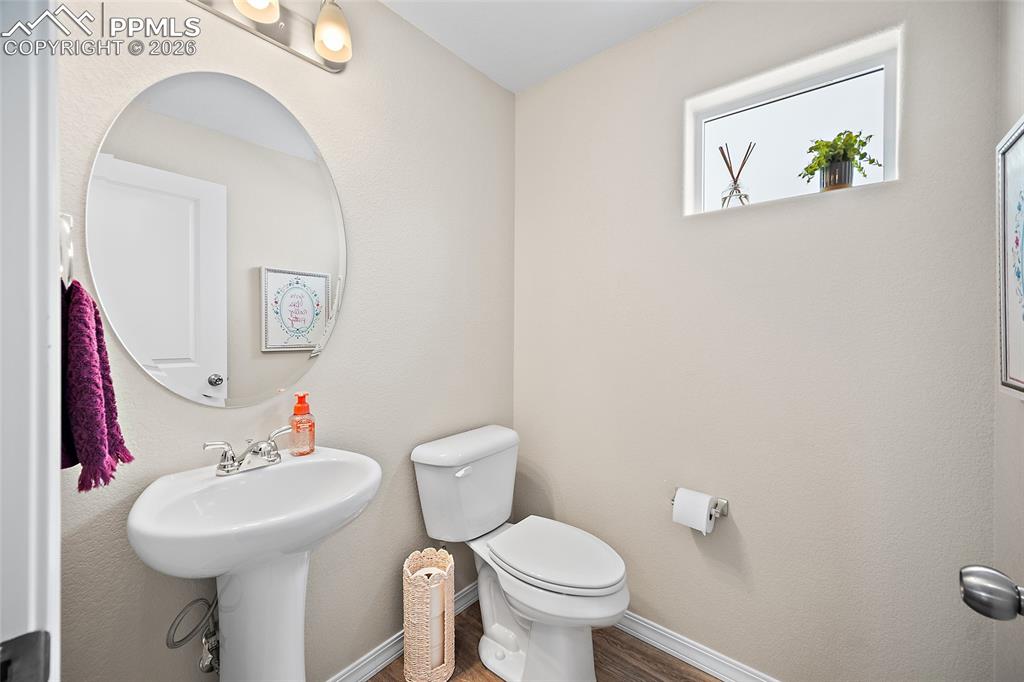 Image 13 of 47: Main level half bath