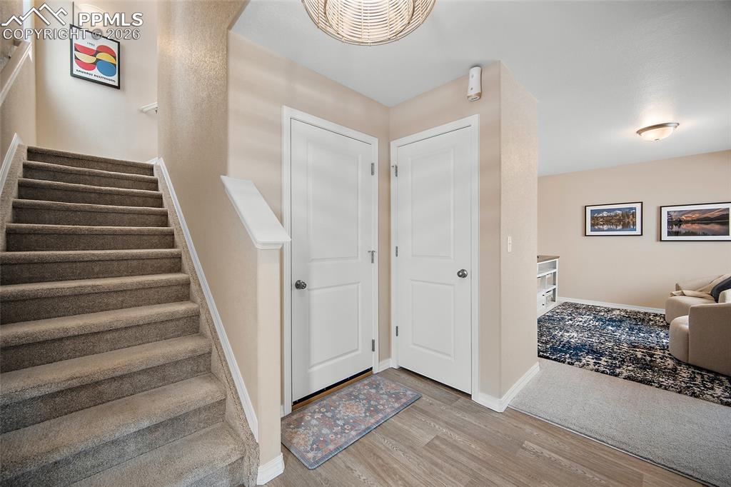 Image 3 of 47: Entry way with office, playroom or sitting room.