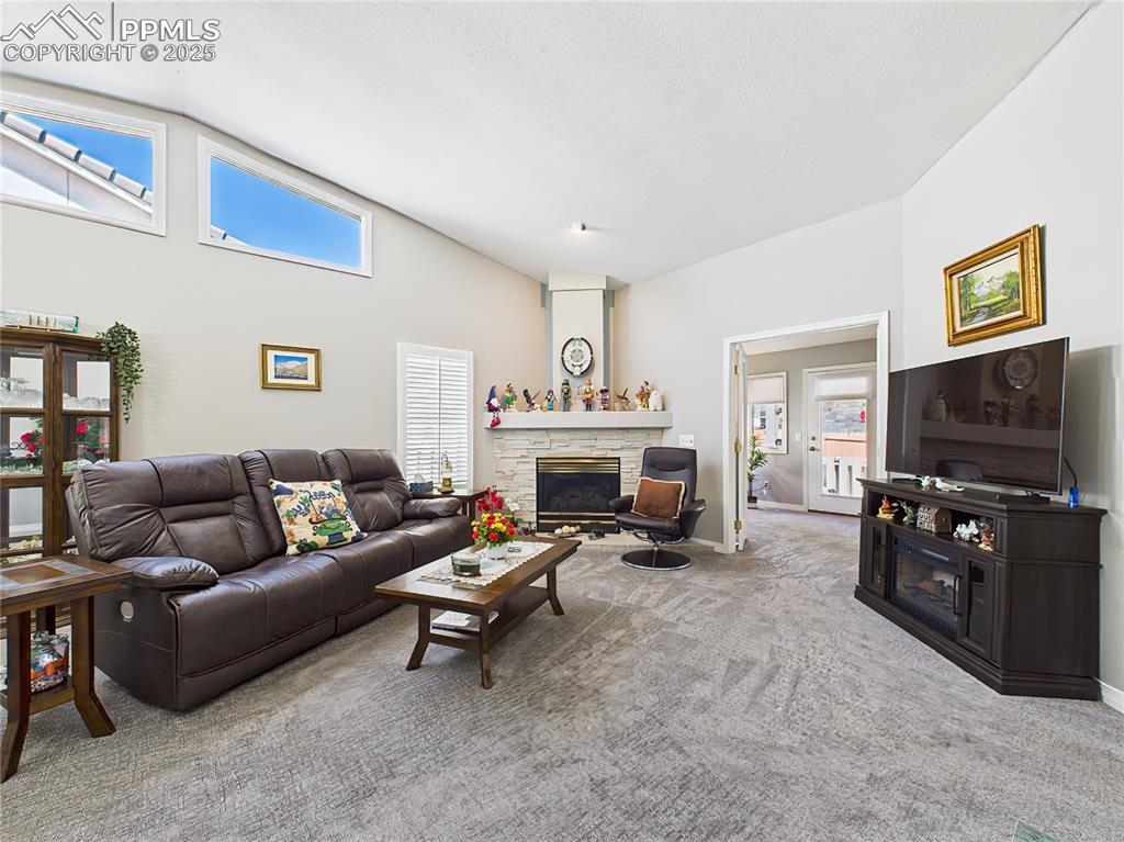 Image 19 of 49: Living Room – Natural light fills the living space, with flexible furniture