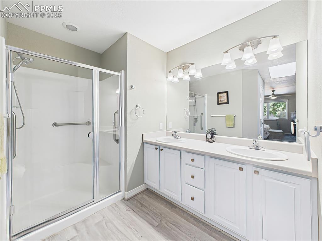 Image 28 of 49: Primary Bathroom – Bright and spacious ensuite featuring a dual-sink vanity