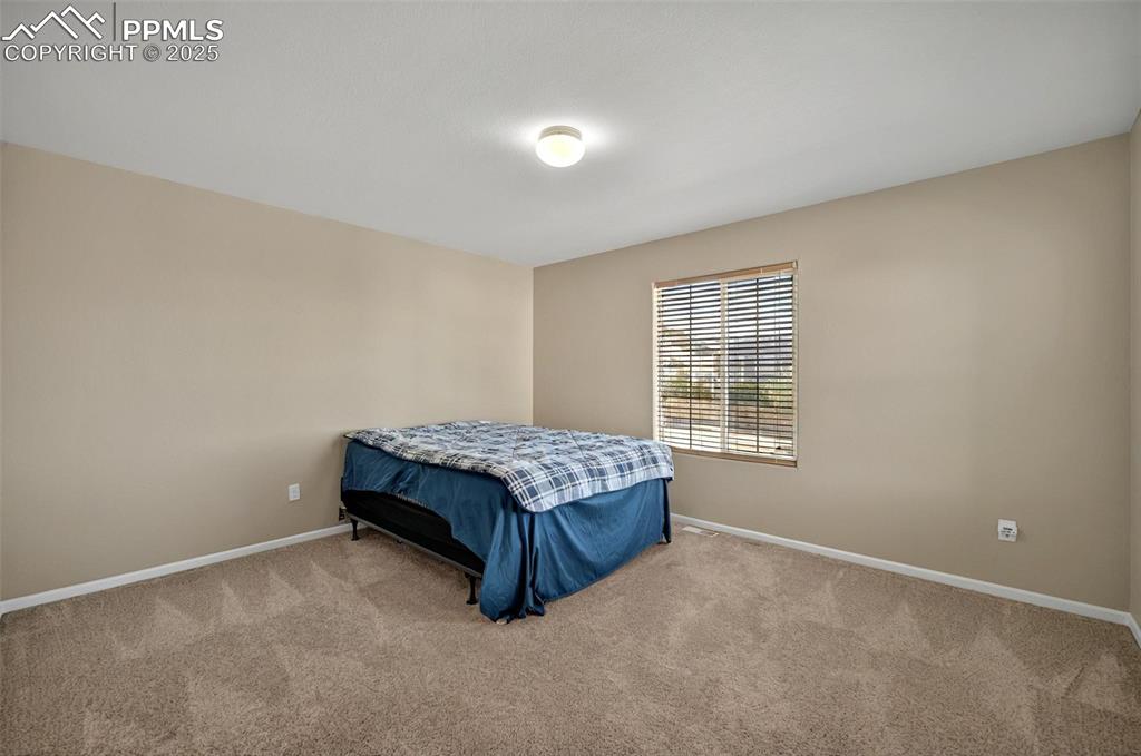 Image 10 of 26: Bedroom