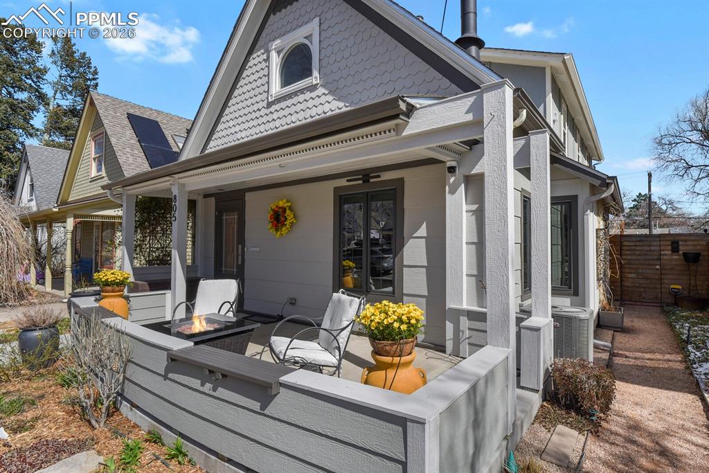 Image 2 of 50: Extended large covered front porch 