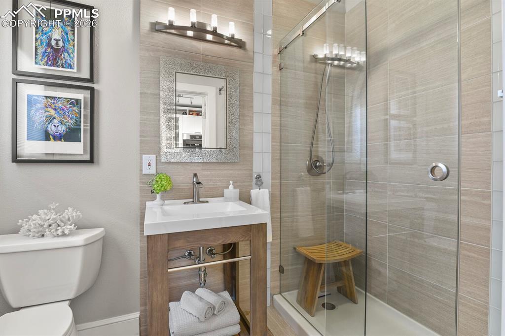 Image 23 of 50: Main level 3/4 bathroom 