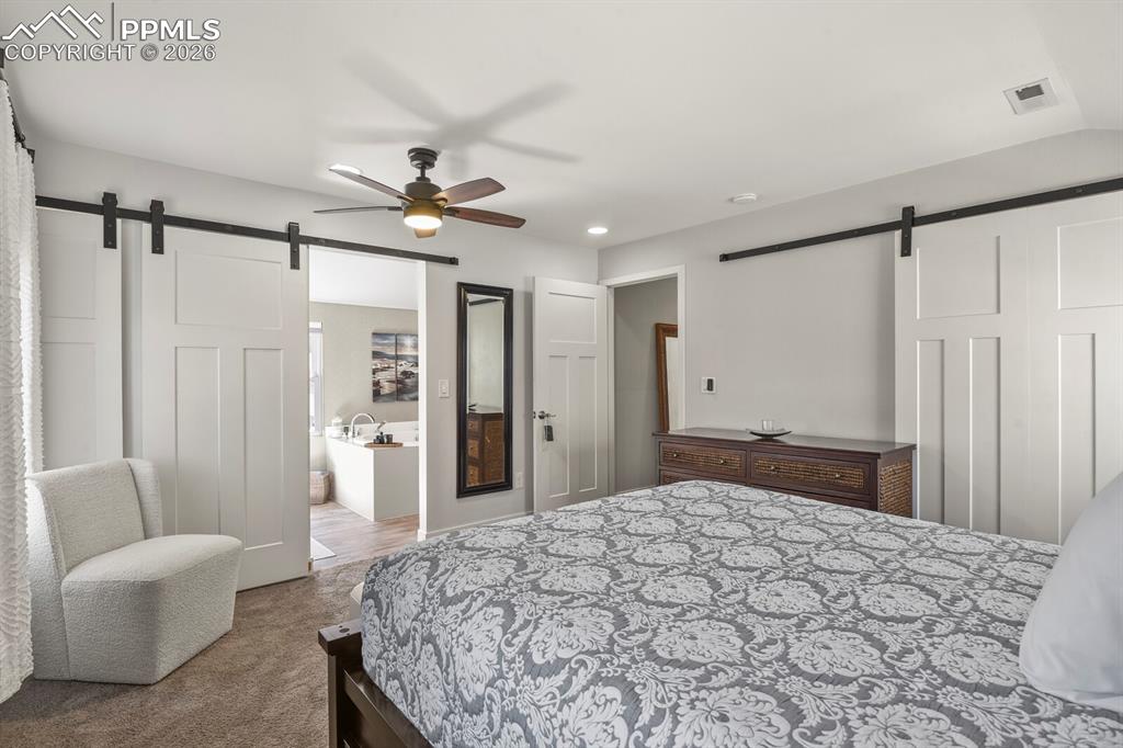 Image 25 of 50: Master Bedroom