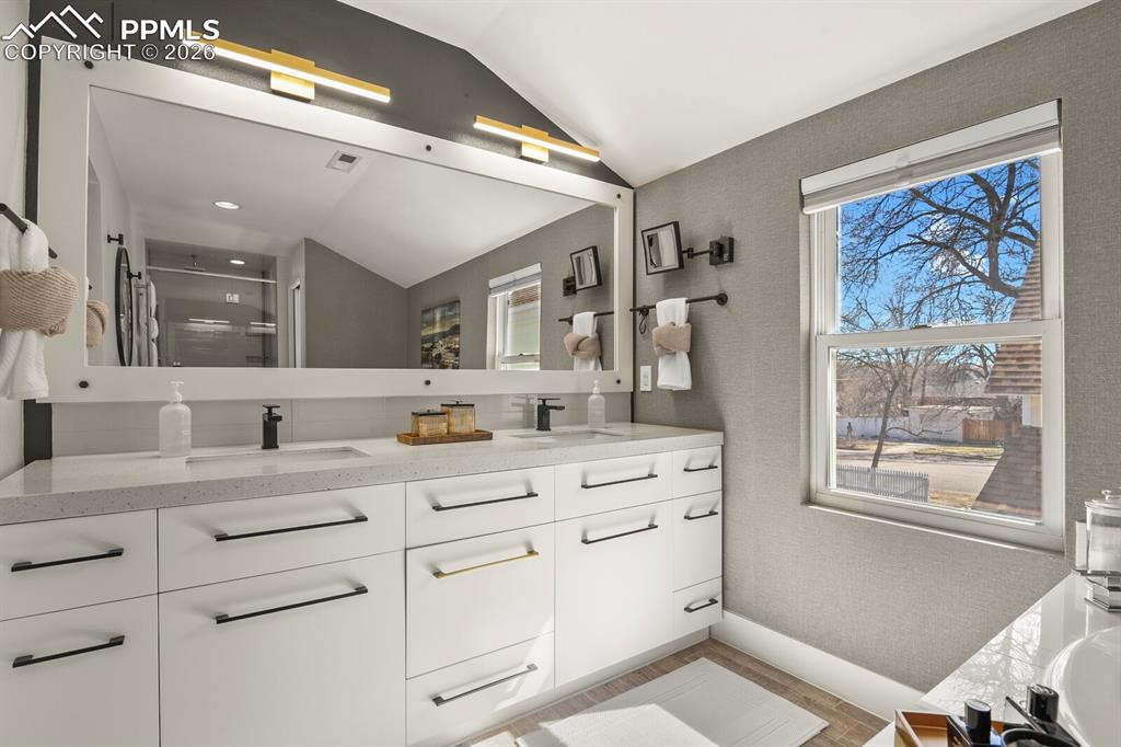 Image 28 of 50: Double sinks in primary bathroom 