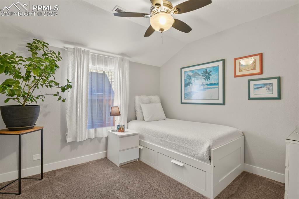 Image 29 of 50: Upper level bedroom 