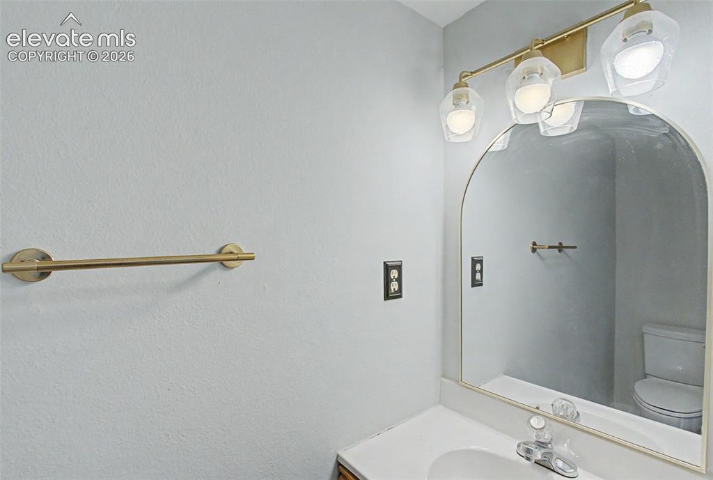 Image 14 of 30: 1/2 bath on main level
