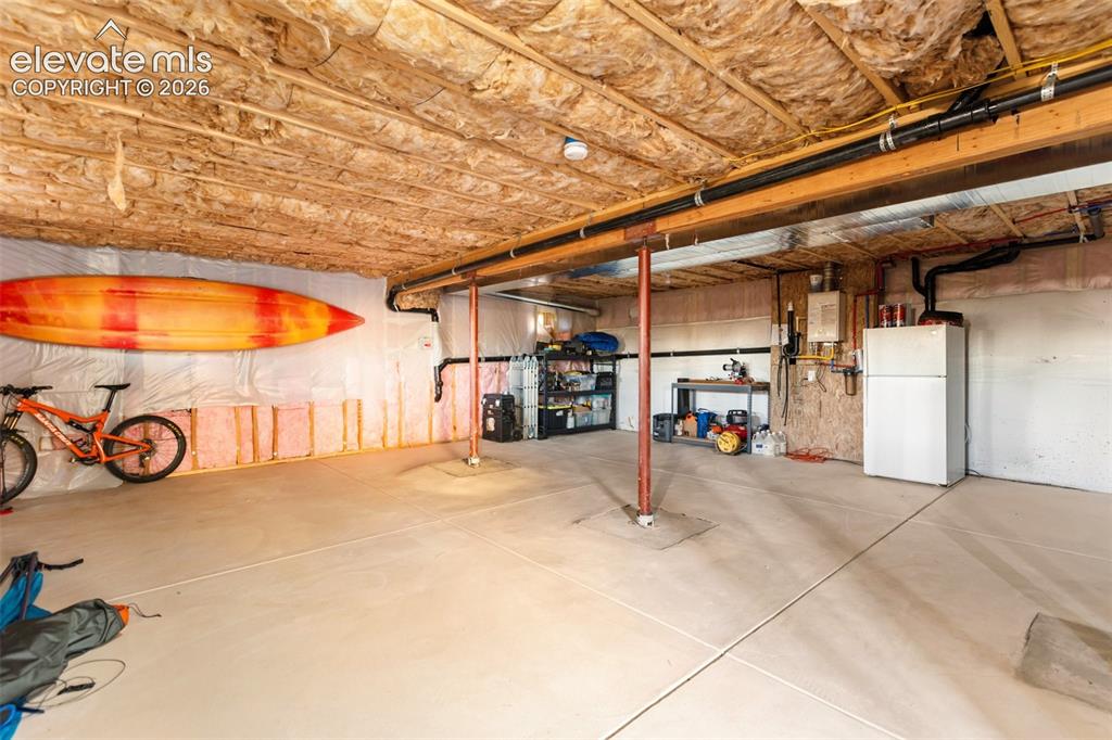 Image 44 of 50: Insulated Basement with Double Doors