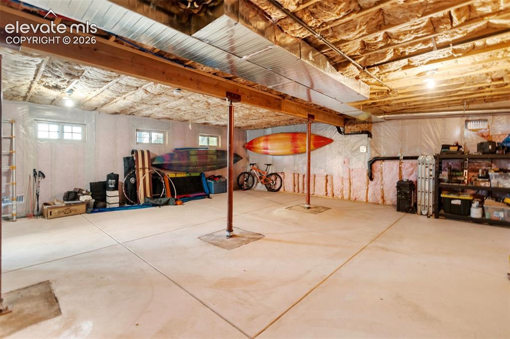 Image 45 of 50: Insulated Basement with Double Doors