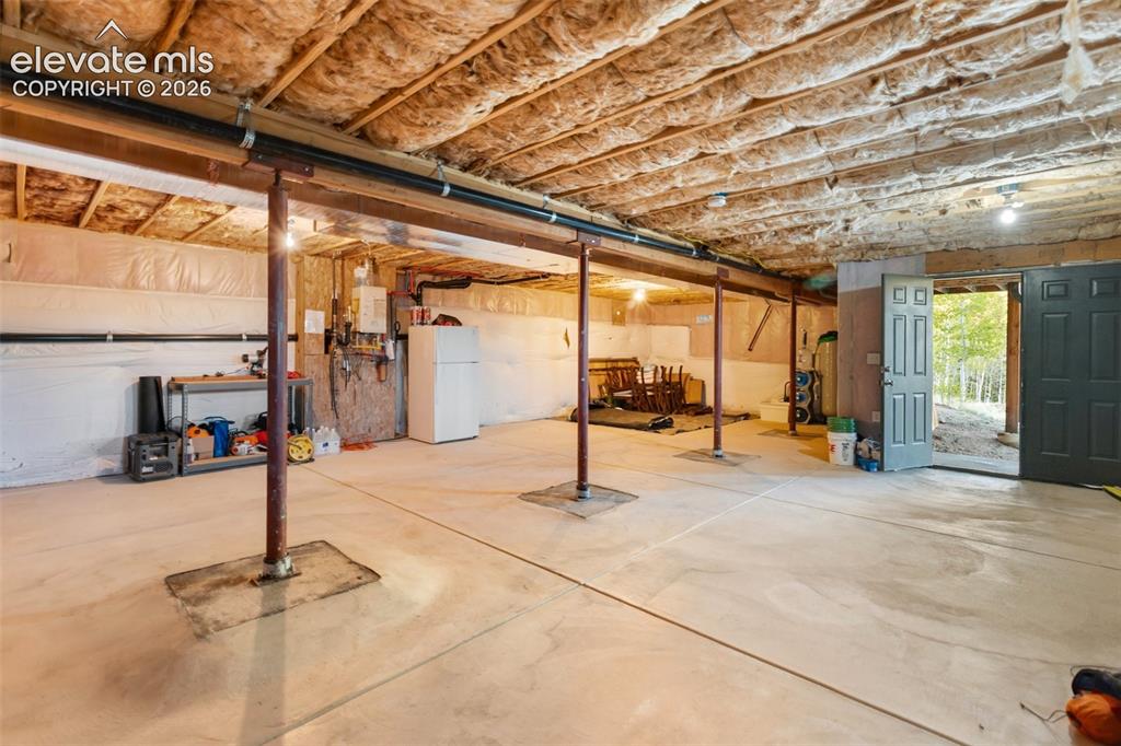 Image 46 of 50: Insulated Basement with Double Doors