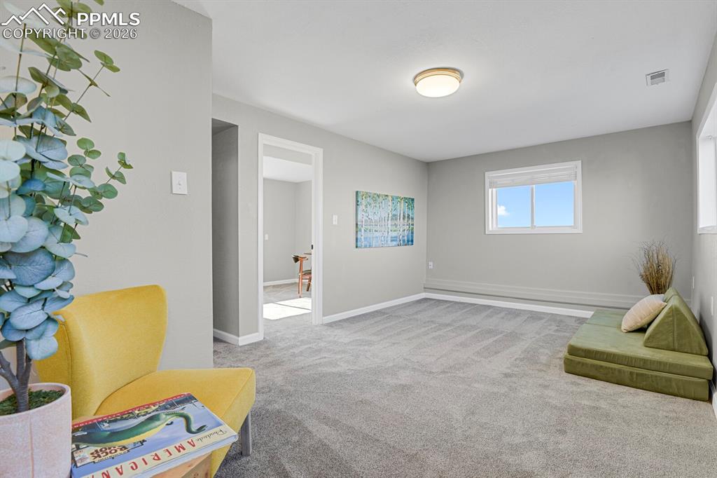 Image 25 of 47: Lower Level Great Room is large and has access to the amazing views