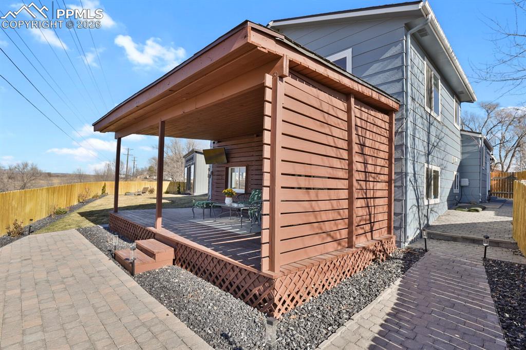 Image 34 of 47: Enjoy the beautiful views and Colorado weather from this huge covered deck