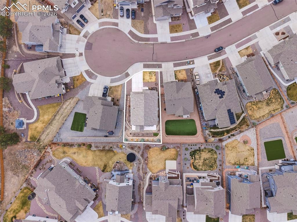 Image 41 of 50: Aerial view highlighting the home’s lot with clearly defined boundaries, si