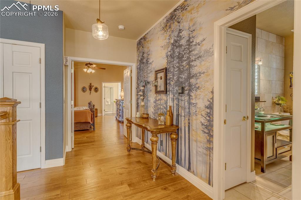 Image 15 of 50: Looking from the Office into the Primary bedroom.