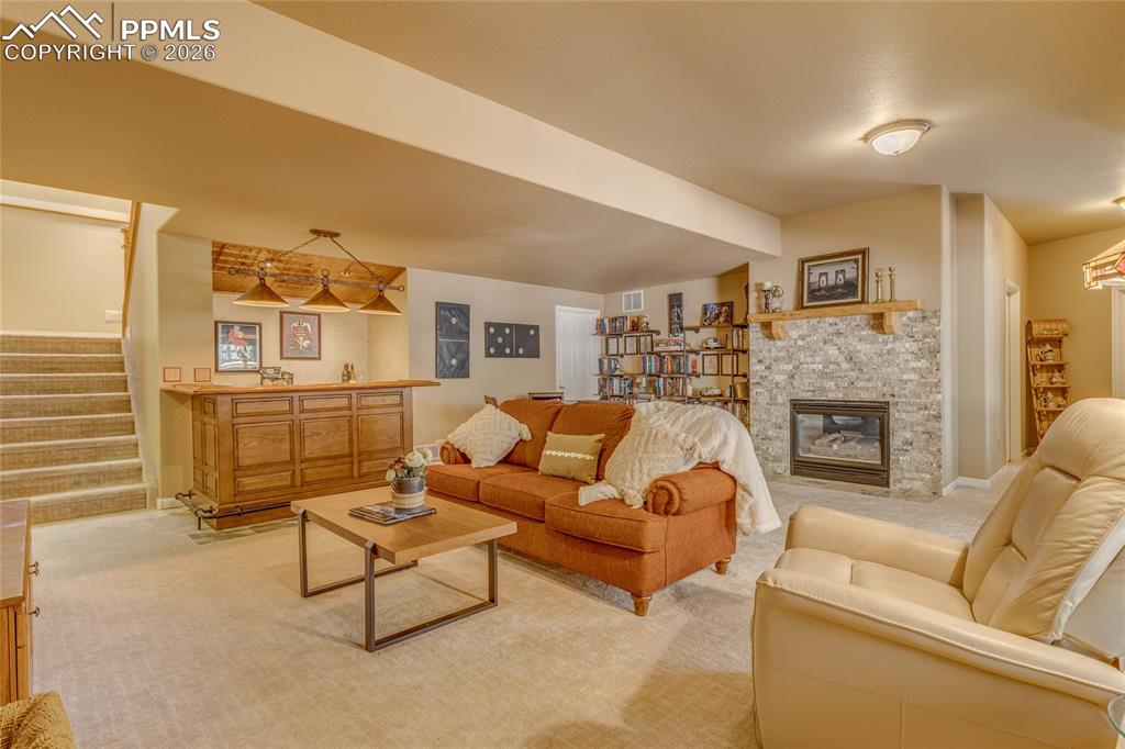 Image 26 of 50: Den in the large open basement.