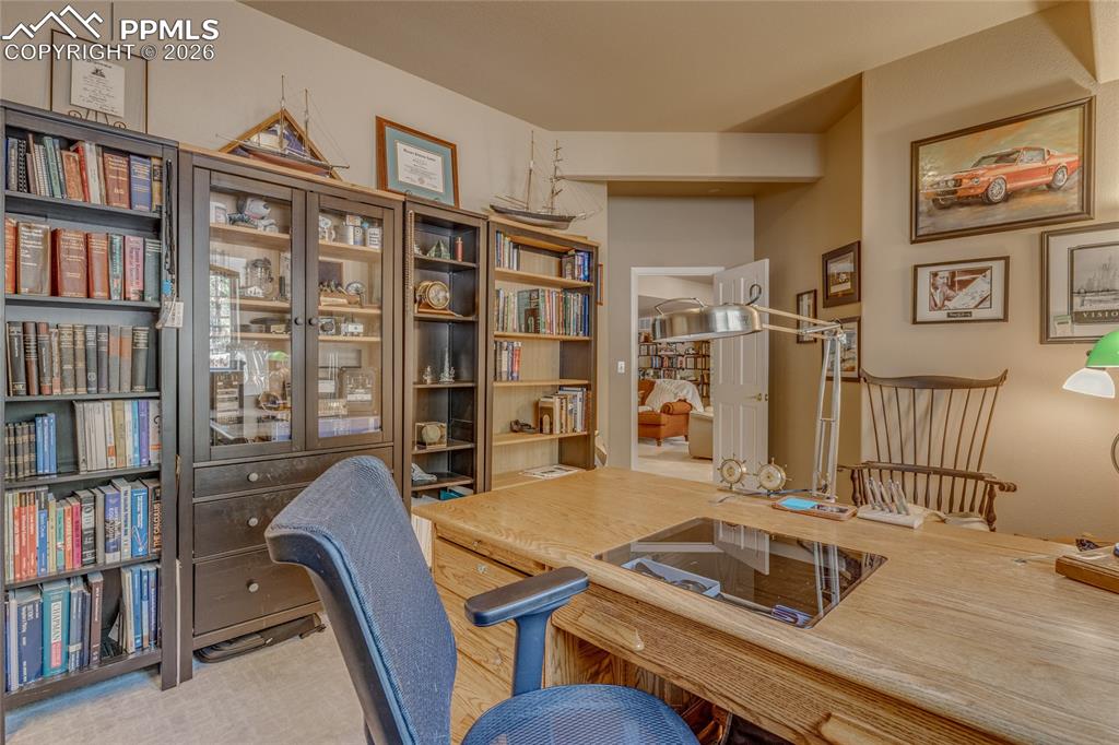 Image 30 of 50: This bonus room located in the basement is currently being used as a second