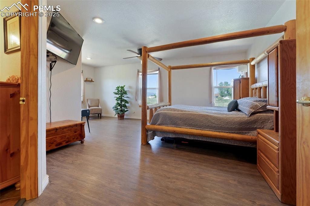 Image 18 of 44: Spacious and Bright Primary Bedroom with Sitting Area/Flex Space