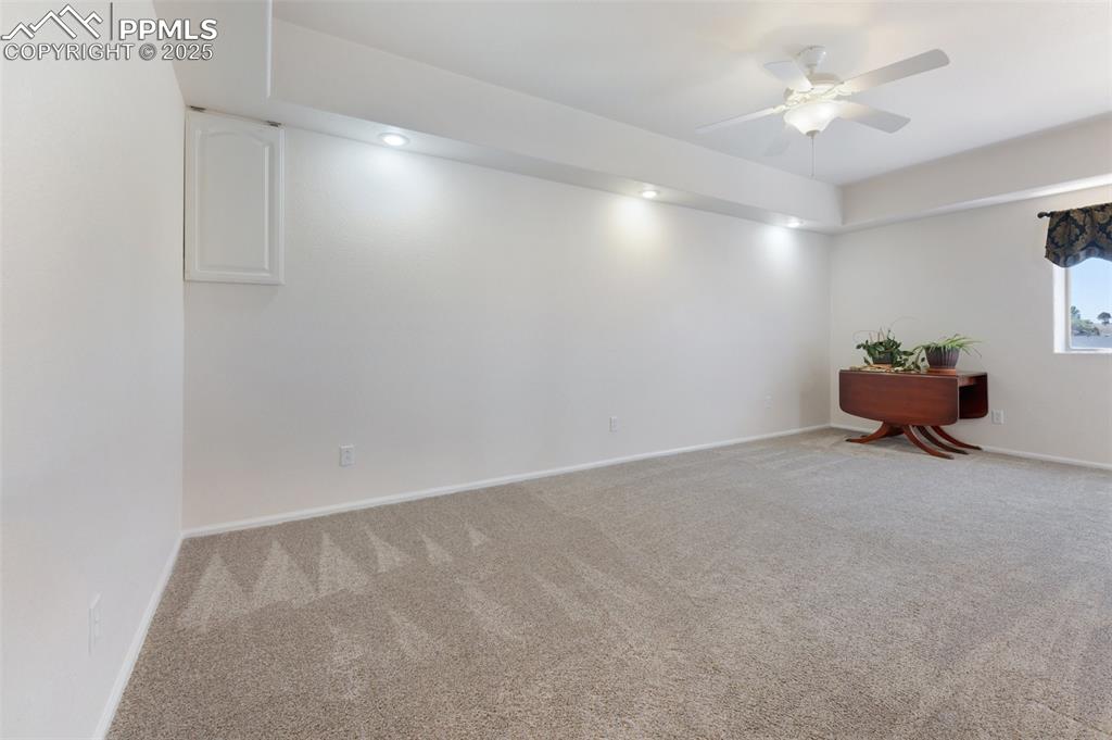 Image 24 of 44: Large and Bright Basement Bedroom with Garden Level Window and Walk-In Clos
