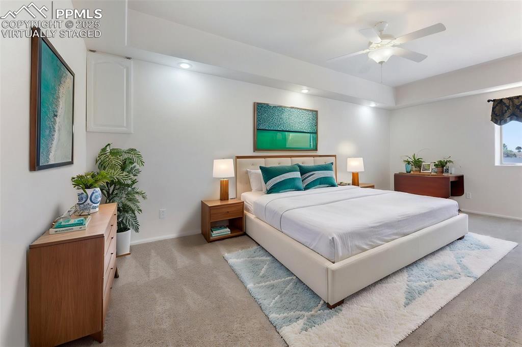 Image 25 of 44: Virtually Staged. Large and Bright Basement Bedroom with Garden Level Windo