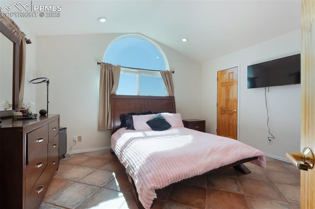Image 8 of 44: Bright Main Level Bedroom with Walk-in Closet