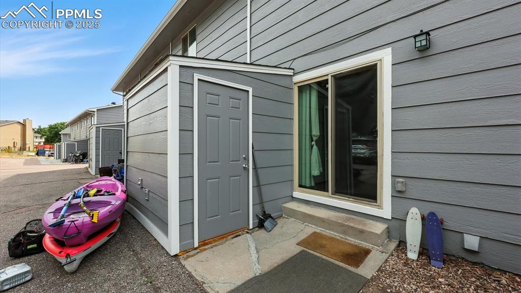 Image 13 of 29: Storage shed for tools and toys.